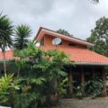 Interesting Design 2 Bedroom Home Surrounded by Tropical Greenery